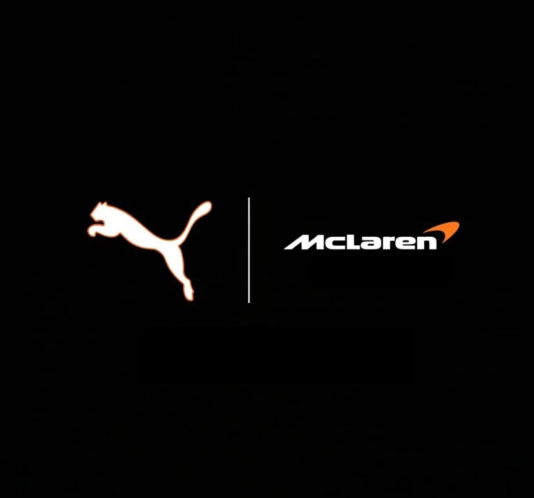 Les logos de Puma et de McLaren, sur un fond noir, séparés par une ligne verticale blanche.